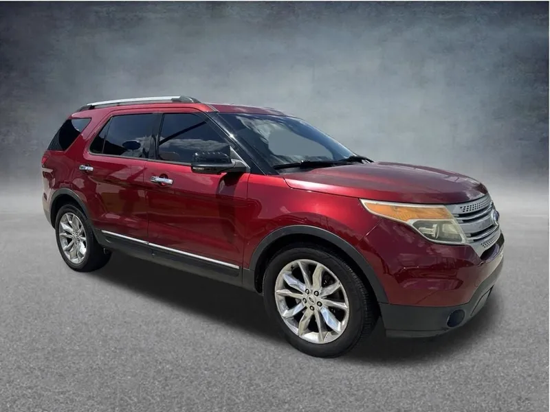 2014 Ford Explorer XLT in Ruby Red Metallic — front three-quarter view