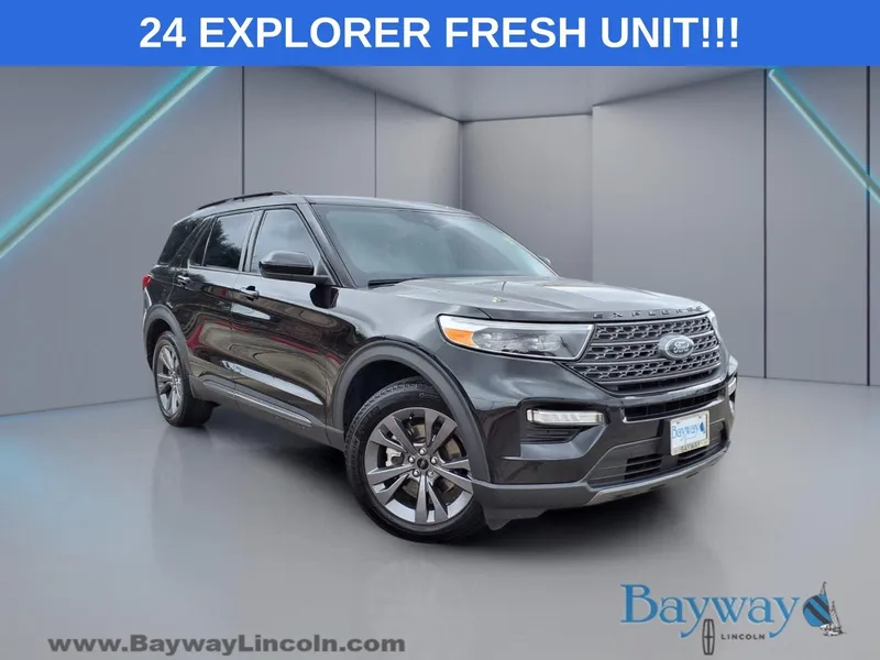 2024 Ford Explorer XLT in Black Metallic — front three-quarter view