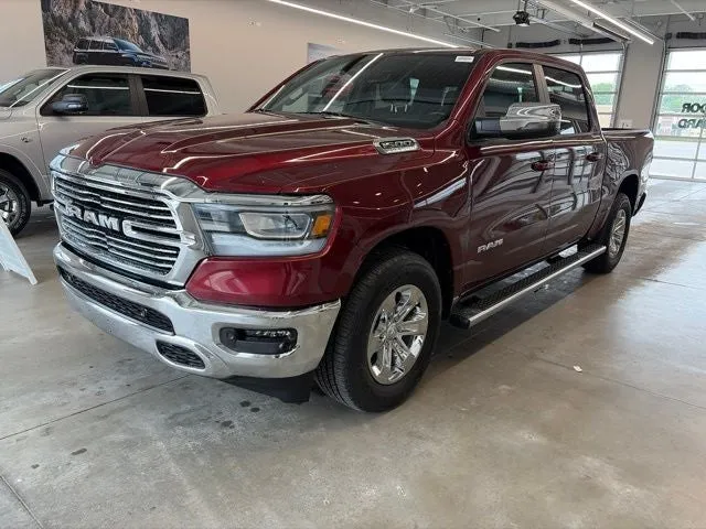 2023 RAM 1500 Laramie Crew Cab 4x4 5'7' Box in Delmonico Red Pearlcoat — front three-quarter view