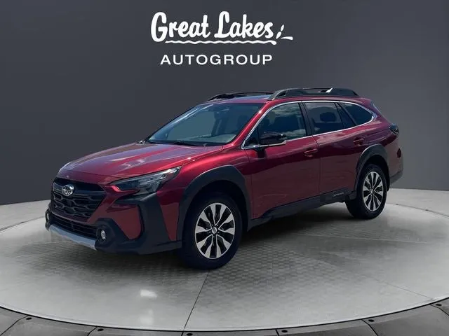 2023 Subaru Outback Limited XT in Crimson Red Pearl — front three-quarter view