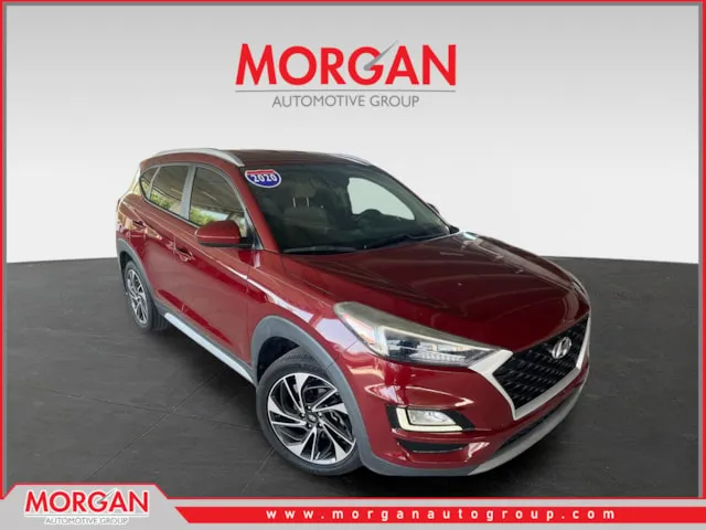 2020 Hyundai Tucson Sport in Red — front three-quarter view