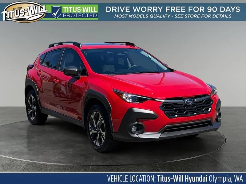 2024 Subaru Crosstrek Premium in Pure Red — front three-quarter view