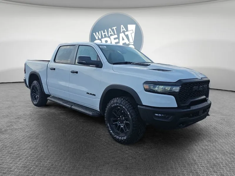 2026 RAM 1500 Rebel in Bright White Clearcoat — front three-quarter view