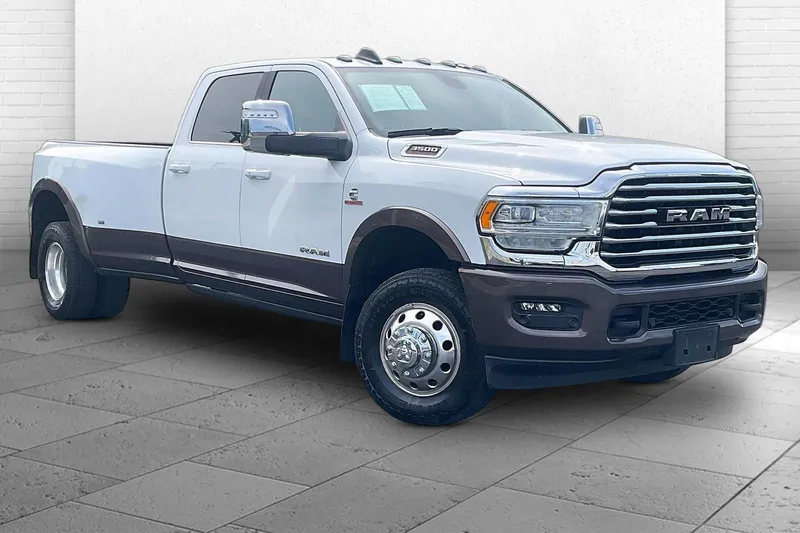 2023 RAM 3500 Longhorn in Bright White Clea — front three-quarter view