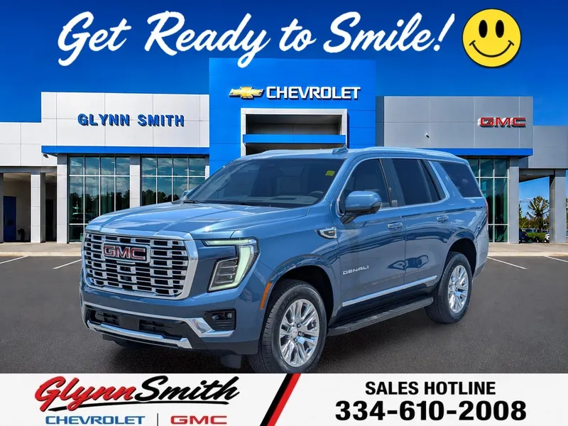 2026 GMC Yukon Denali in Downpour Metallic — front three-quarter view