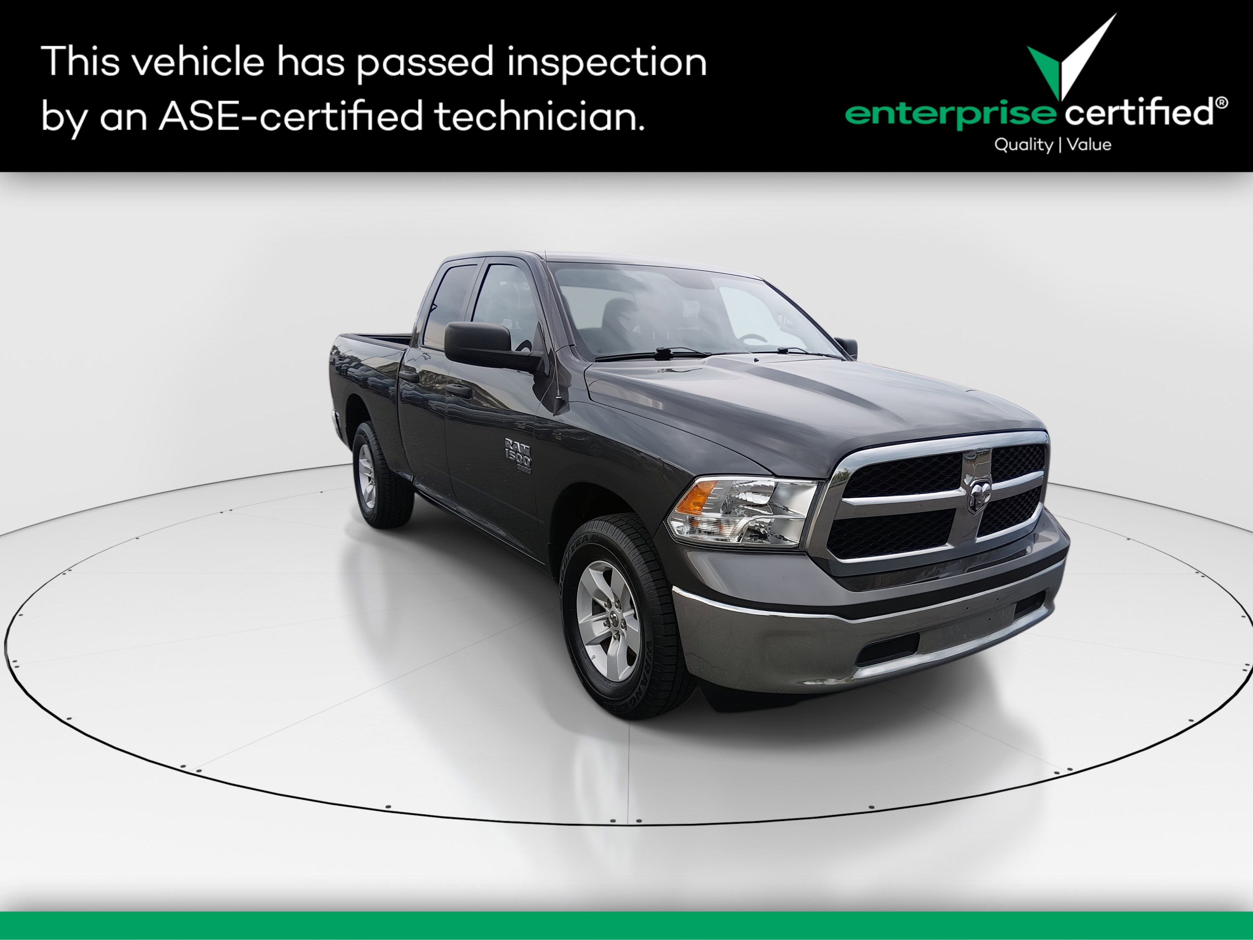2024 Ram 1500 Classic SLT 4x4 Quad Cab 6'4" Box — front three-quarter view