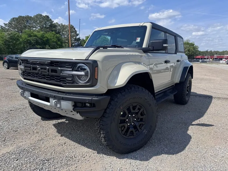 2026 Ford Bronco Raptor in Desert Sand — front three-quarter view