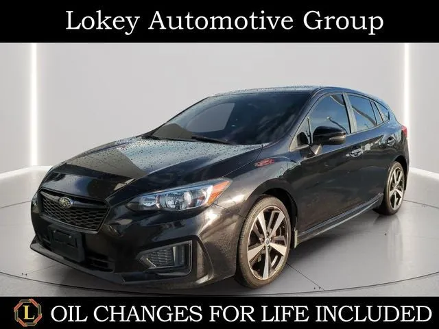 2018 Subaru Impreza 2.0i Sport in Crystal Black Silica — front three-quarter view
