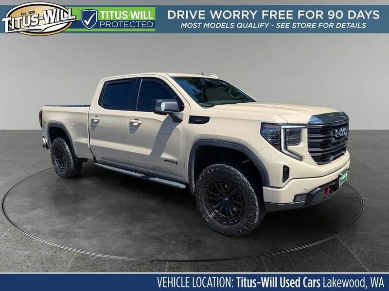 2023 GMC Sierra 1500 AT4 in Desert Sand Metallic — front three-quarter view