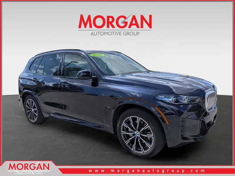 2026 BMW X5 xDrive40i in Carbon Black Metallic — front three-quarter view