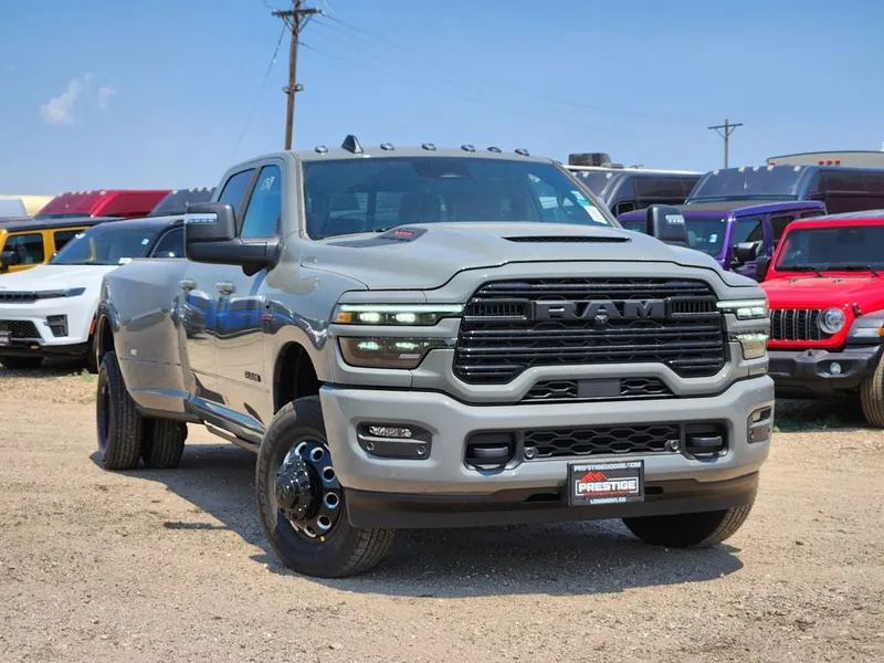 2026 RAM 3500 RAM 3500 LARAMIE CREW CAB 4X4 8' BOX in Ceramic Gray Clear-Coat Exterior Paint — front three-quarter view