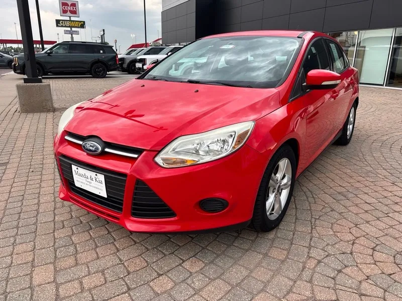 2014 Ford Focus SE in Red — front three-quarter view