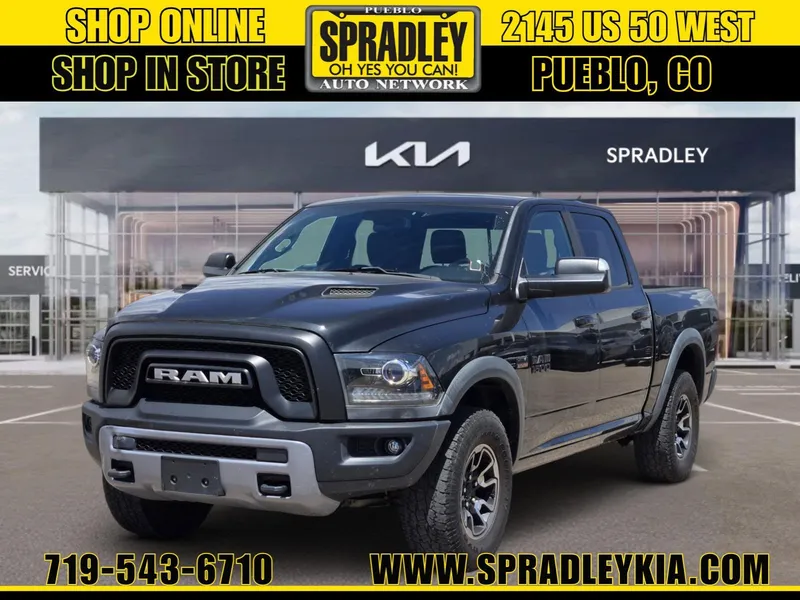 2016 RAM 1500 Rebel in Brilliant Black Crystal Pearlcoat — front three-quarter view