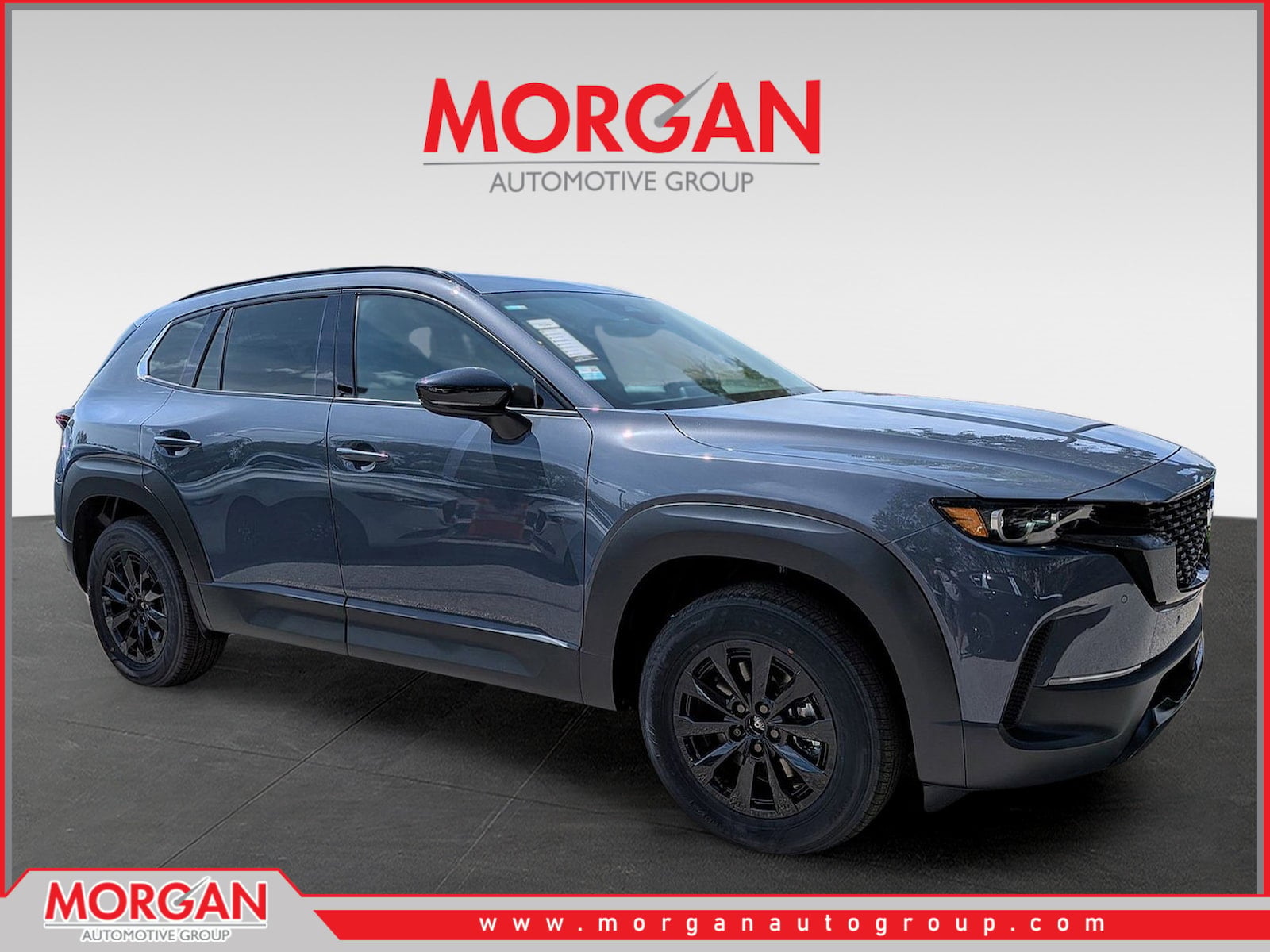 2026 Mazda CX-50 Hybrid Premium in Gray — front three-quarter view