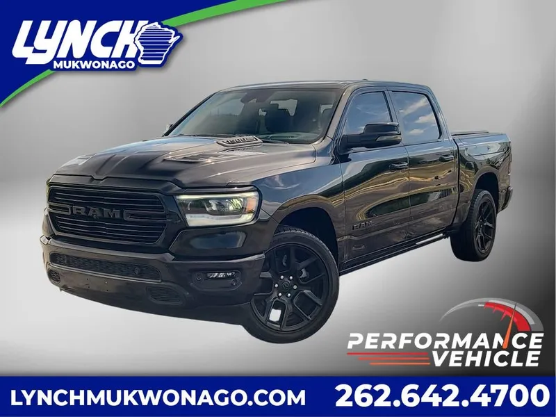 2024 RAM 1500 Laramie GT in Diamond Black Crystal Pearlcoat — front three-quarter view