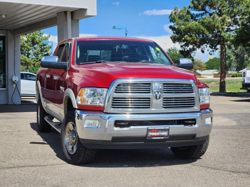 2010 Dodge 3500 Laramie in Inferno Red Crystal Pearlcoat — front three-quarter view
