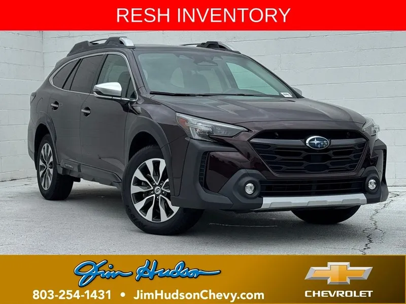 2023 Subaru Outback Touring XT in Mahogany Pearl — front three-quarter view