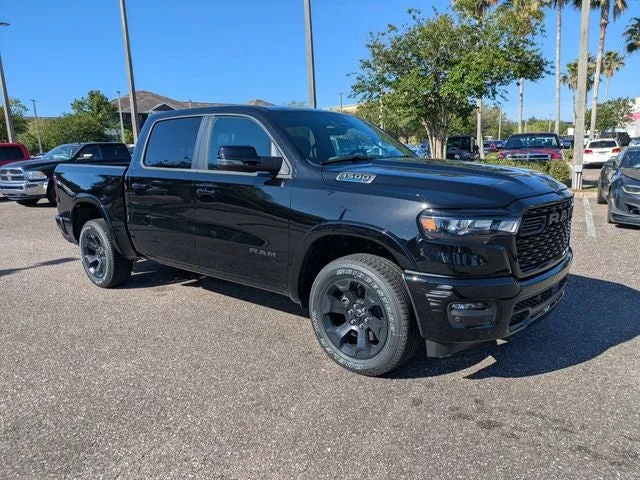 2026 RAM 1500 Big Horn/Lone Star in Diamond Black Crystal Pearl-Coat Exterior Paint — front three-quarter view