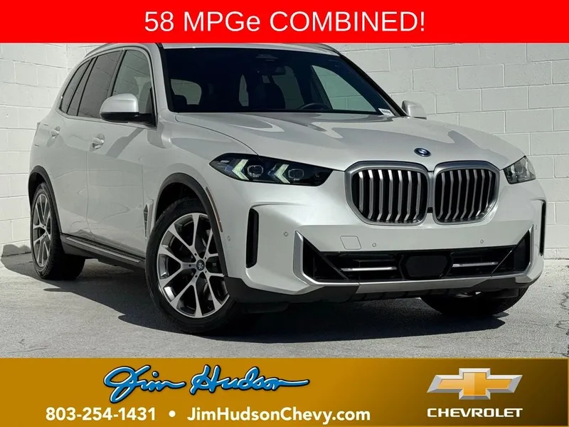 2025 BMW X5 xDrive50e in White Metallic — front three-quarter view
