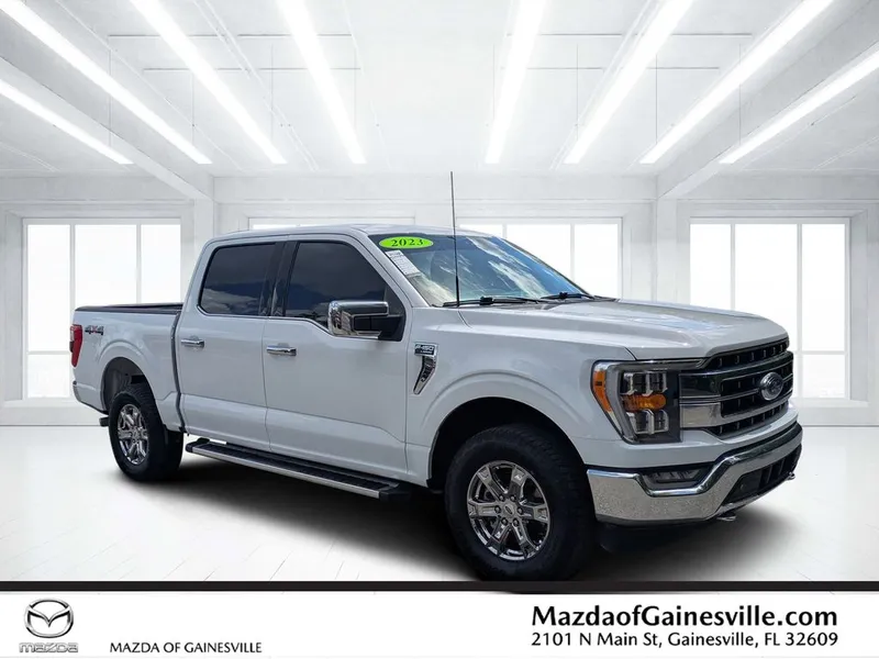 2023 Ford F-150 Lariat in White — front three-quarter view