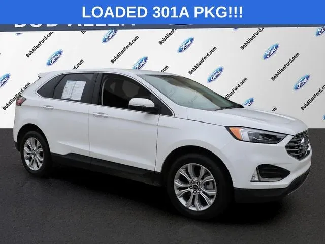 2024 Ford Edge Titanium in Star White Metallic Tri-Coat — front three-quarter view