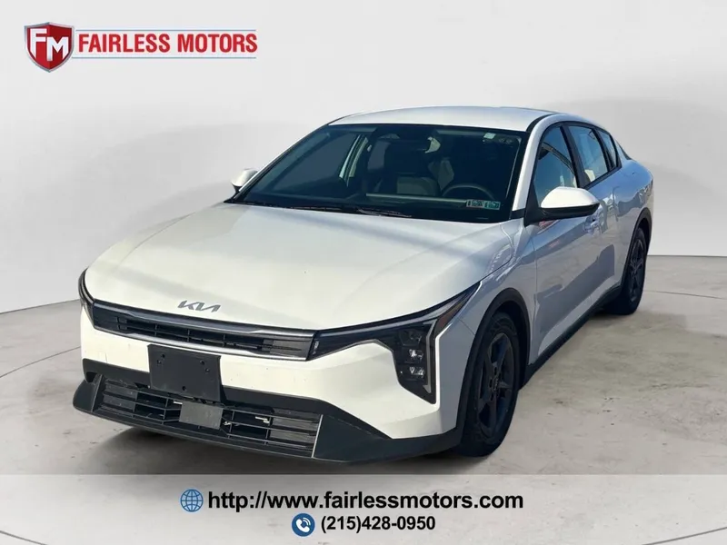 2025 Kia K4 LXS 4dr Sedan in Snow White Pearl — front three-quarter view