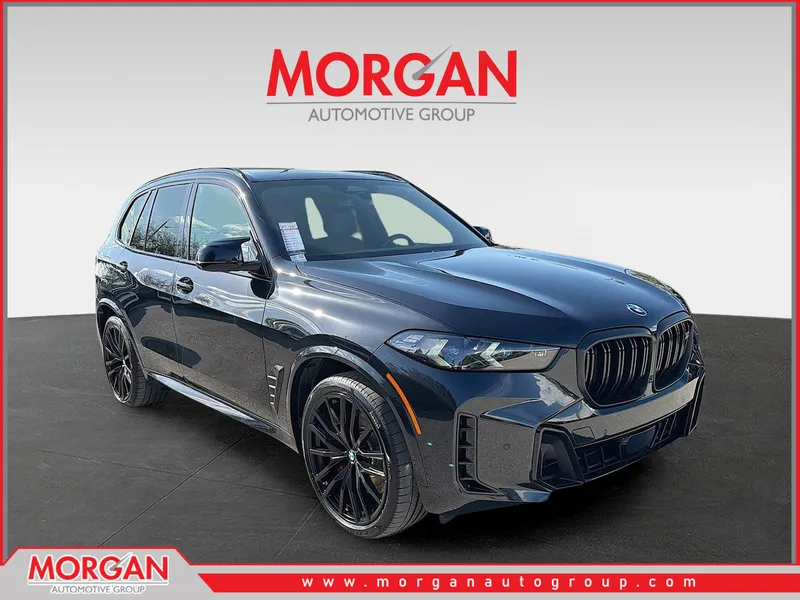 2024 BMW X5 M60i in Black — front three-quarter view