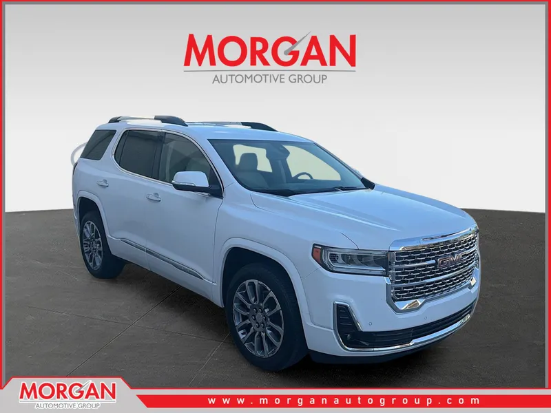 2023 GMC Acadia Denali in Summit White — front three-quarter view