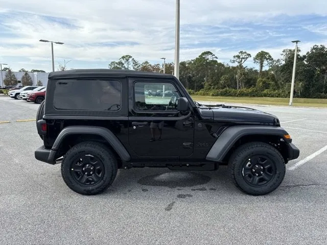 2026 Jeep Wrangler Sport in Black Clearcoat — front three-quarter view