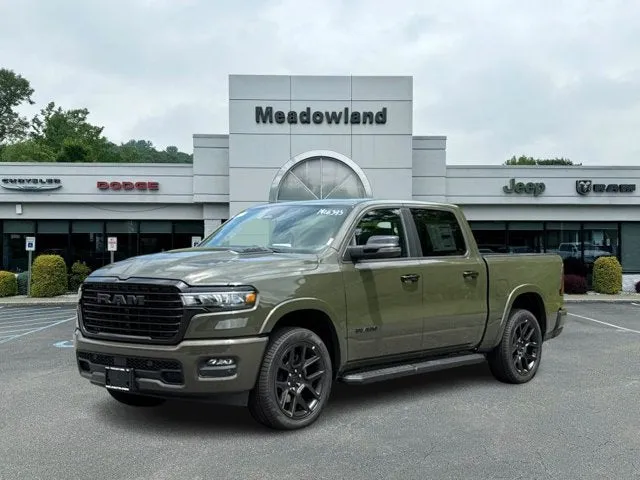 2026 RAM 1500 Laramie in Tank Exterior Paint — front three-quarter view