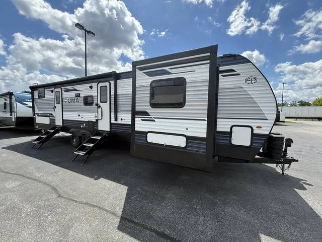 2027 Palomino PUMA 32BHQS — front three-quarter view
