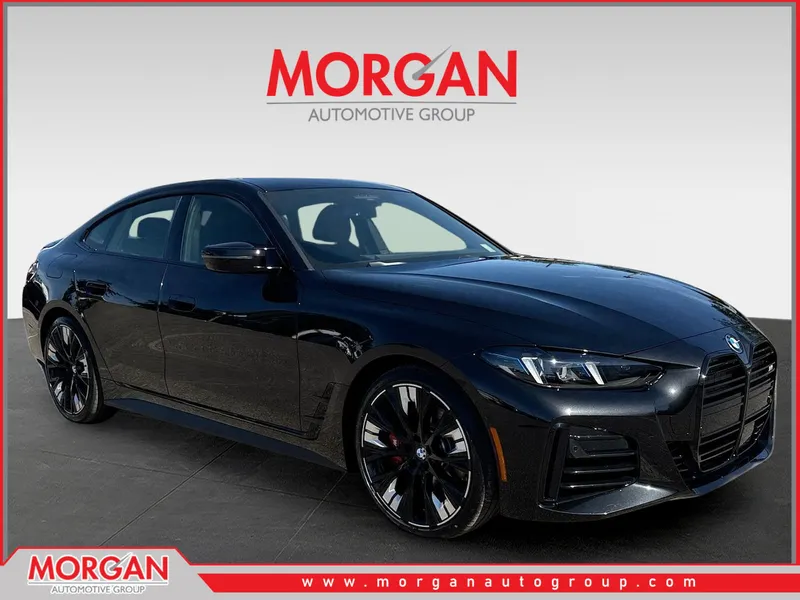 2026 BMW 4 Series M440i in Black Sapphire Metallic — front three-quarter view