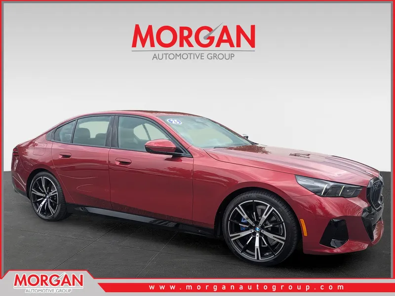 2025 BMW 5 Series 530i in Red — front three-quarter view