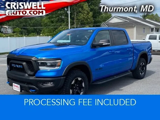 2021 RAM 1500 Rebel Crew Cab 4x4 5'7' Box in Hydro Blue Pearlcoat — front three-quarter view