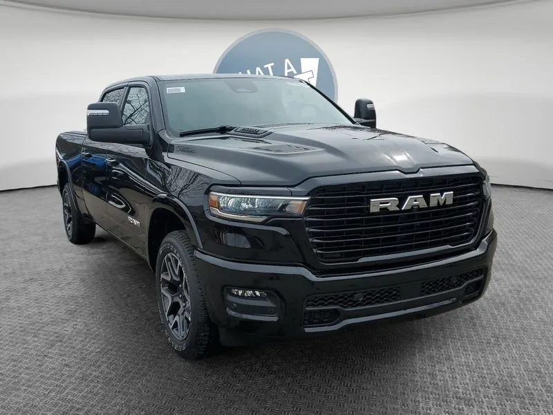 2026 RAM 1500 RAM 1500 LARAMIE CREW CAB 4X4 6'4' BOX in Diamond Black Crystal Pearl-Coat Exterior Paint — front three-quarter view