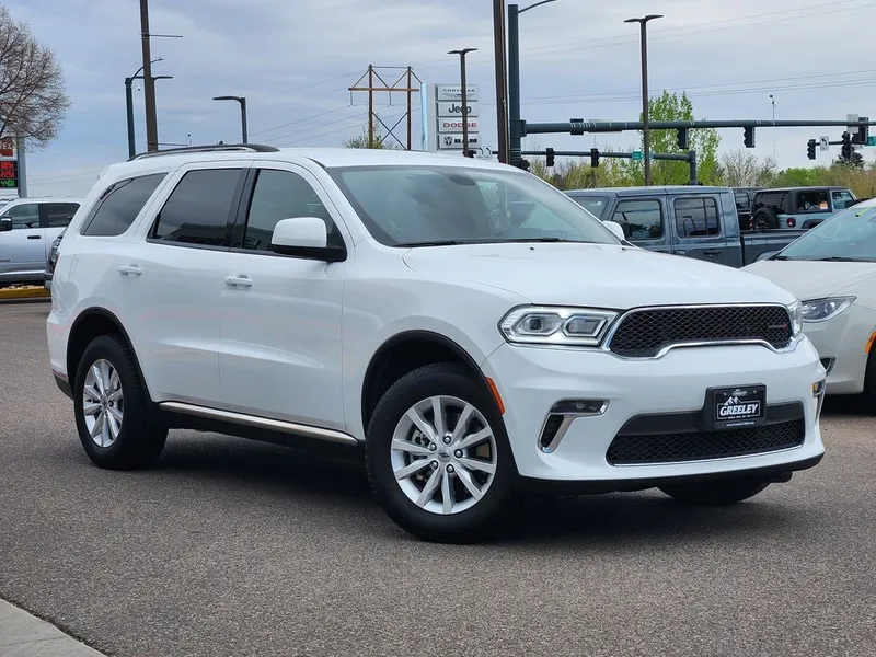 2021 Dodge Durango SXT Plus AWD in White Knuckle Clearcoat — front three-quarter view