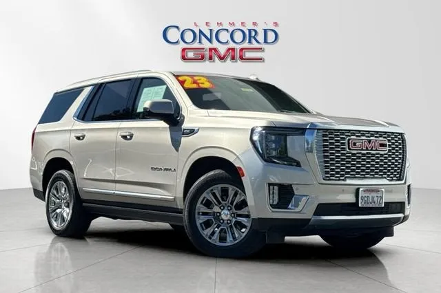 2023 GMC Yukon Denali in Pearl Beige Metallic — front three-quarter view