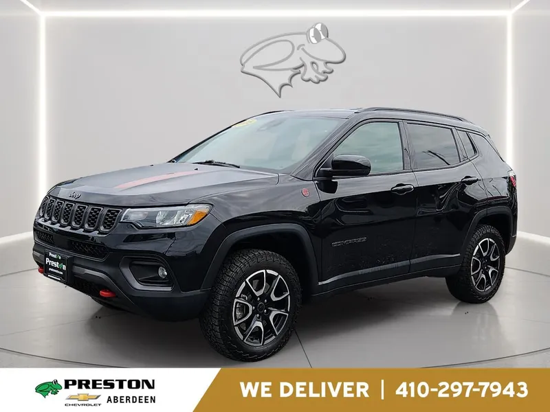 2025 Jeep Compass Trailhawk in Black — front three-quarter view