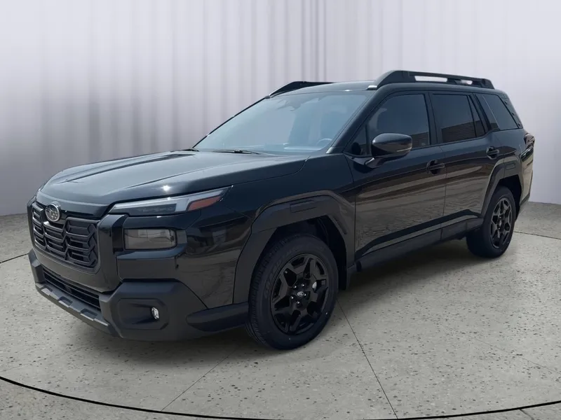 2026 Subaru OUTBACK Limited in Crystal Black Silica — front three-quarter view