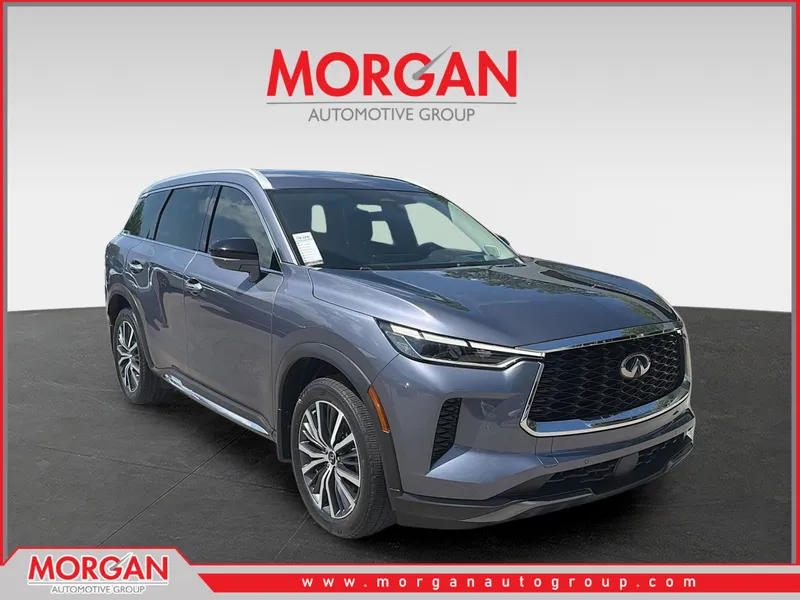 2023 INFINITI QX60 SENSORY in Moonbow Blue — front three-quarter view