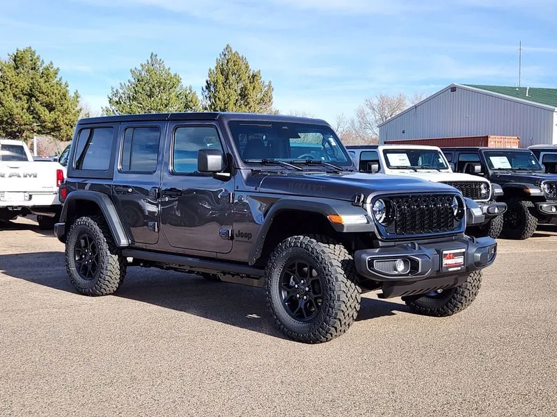 2026 Jeep Wrangler WRANGLER 4-DOOR WILLYS in Granite Crystal Metallic Clear-Coat Exterior Paint — front three-quarter view