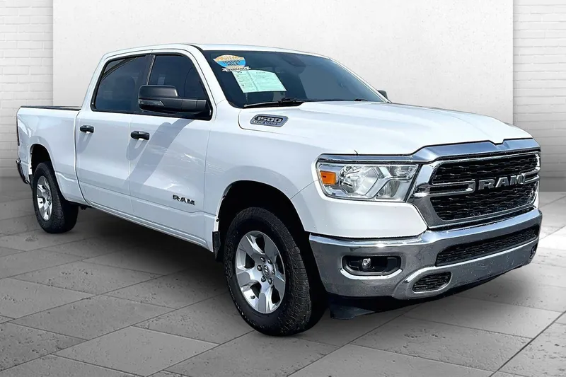 2024 RAM 1500 Lone Star in Bright White Clea — front three-quarter view