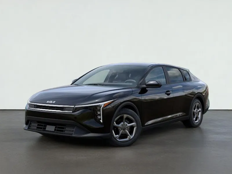 2026 Kia K4 LXS in Aurora Black Pearl — front three-quarter view