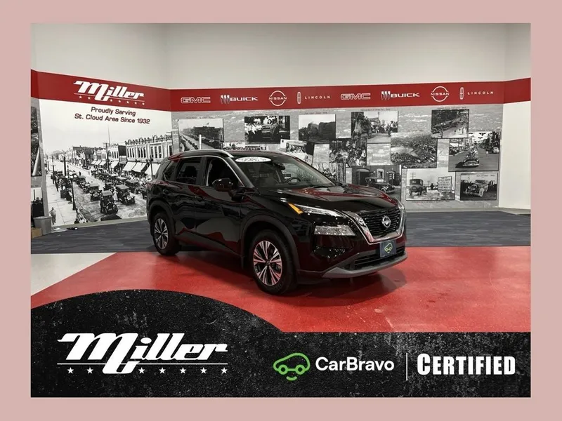 2023 Nissan Rogue SV CarBravo Certified in Super Black — front three-quarter view