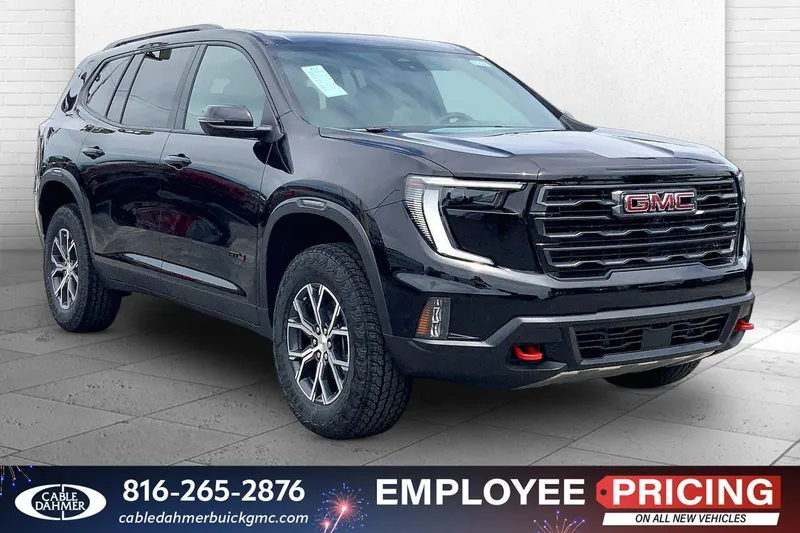 2026 GMC Acadia AT4 in Ebony Twilight Metallic — front three-quarter view