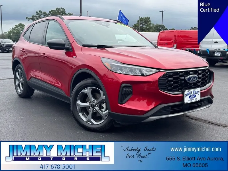 2025 Ford Escape ST-Line in Rapid Red Metallic Tinted Clearcoat — front three-quarter view