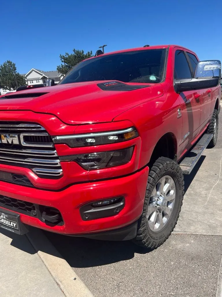 2026 RAM 2500 Laramie Crew Cab 4x4 6'4' Box in Flame Red Clearcoat — front three-quarter view