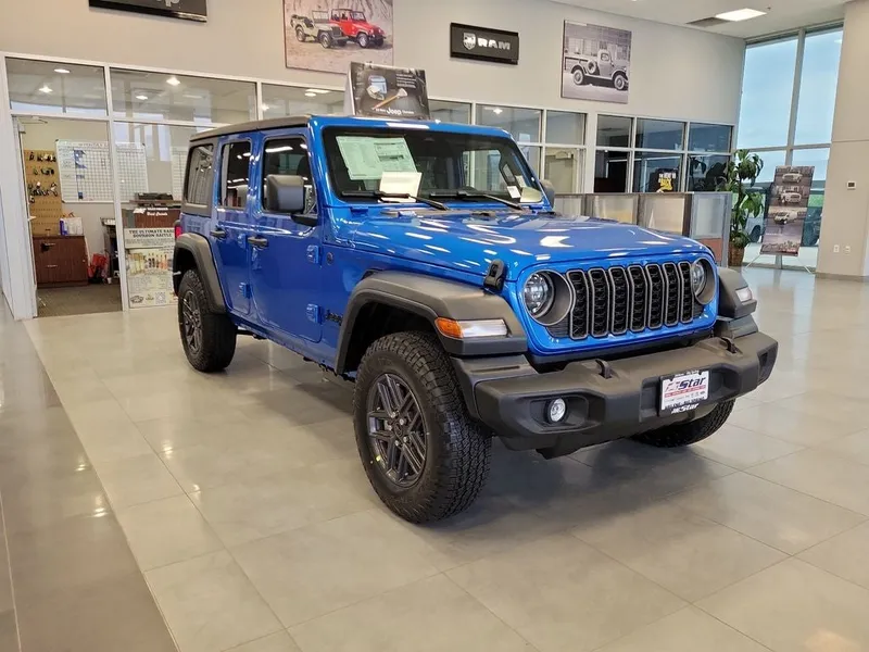 2026 Jeep Wrangler Sport S in Hydro Blue Pearl Coat — front three-quarter view