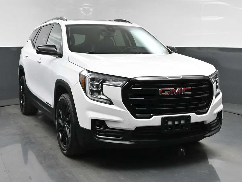 2023 GMC Terrain SLT in Summit White — front three-quarter view