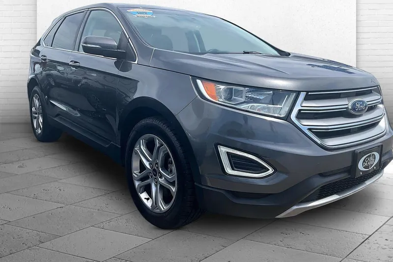 2017 Ford Edge Titanium in Magnetic Metallic — front three-quarter view
